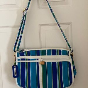 New canvas bag, shoulder strap, lot of compartments! Great for travel!